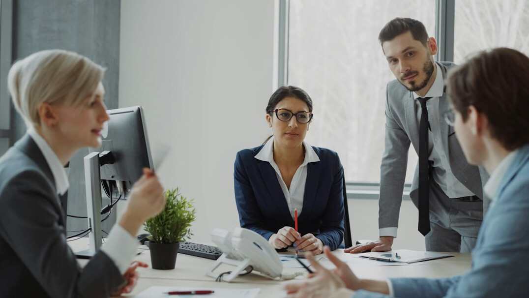 business executives in meeting